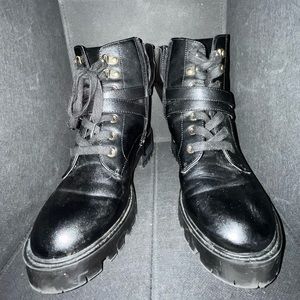 Size 5.5 black combat boots.